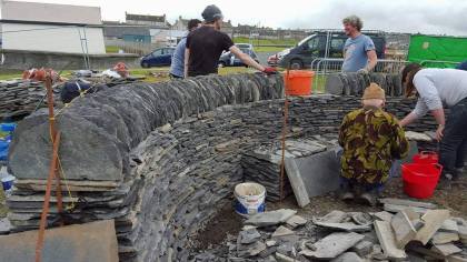Building the drystone wall and seat